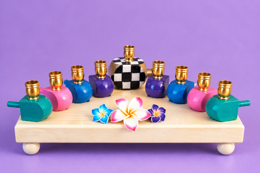The Abigail Menorah

Hand-Painted Colorful Dreidel & Floral Menorah