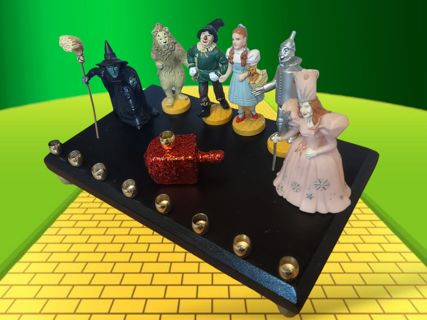 One of kind Collector Wizard of Oz Menorah with ruby red dreidel

Hand-crafted Wizard of Oz Menorah from repurposed figures, wood dreidel, wood plaque, brass candle cups, acrylic paint and glitter.

This Collectors Menorah will make a statement for your H