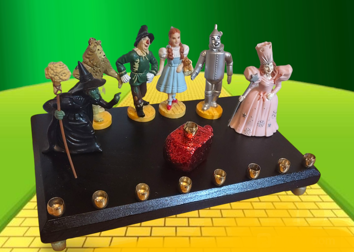 One of kind Collector Wizard of Oz Menorah with ruby red dreidel

Hand-crafted Wizard of Oz Menorah from repurposed figures, wood dreidel, wood plaque, brass candle cups, acrylic paint and glitter.

This Collectors Menorah will make a statement for your H