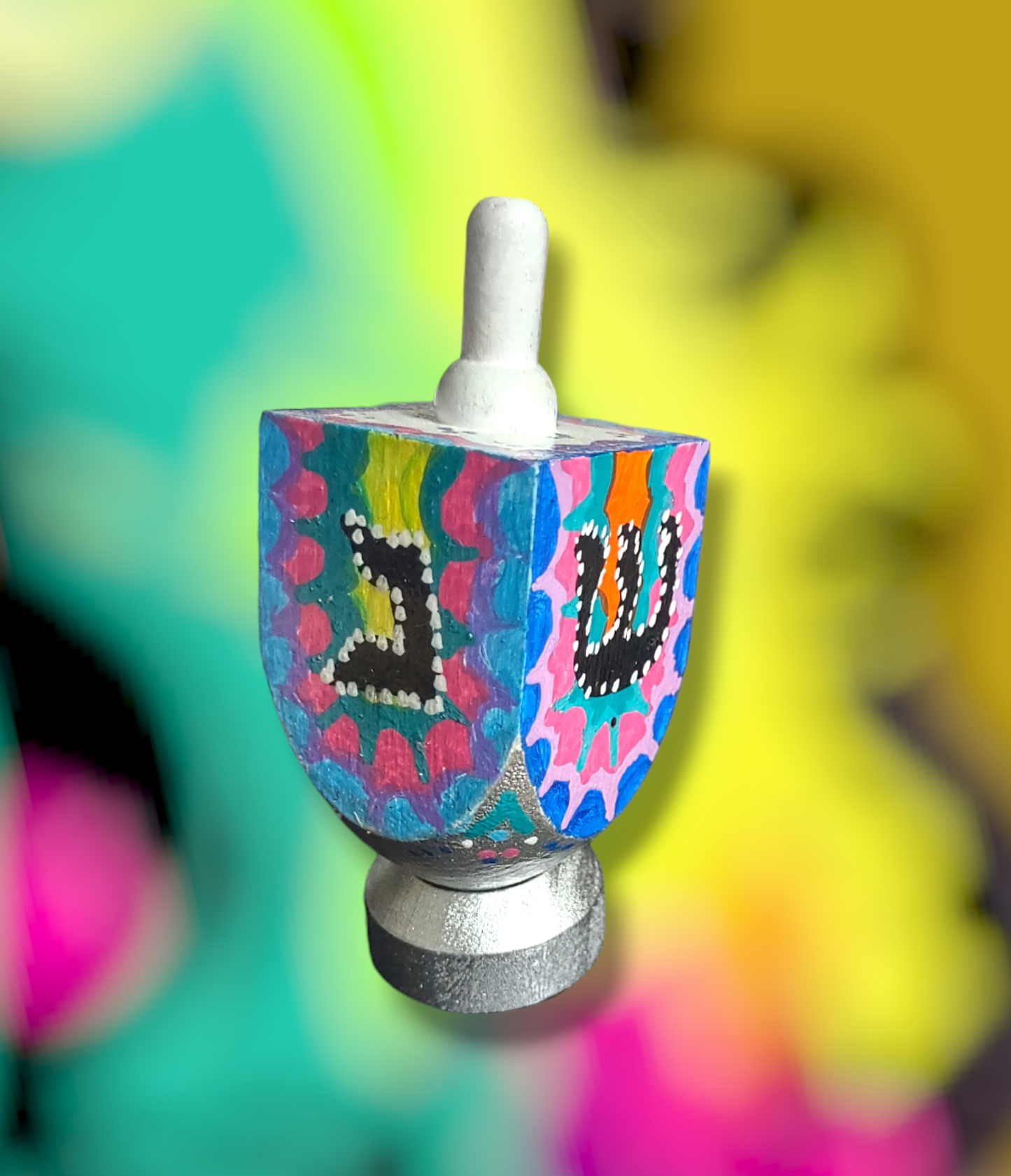 Hand-painted Neon Funky dreidel.